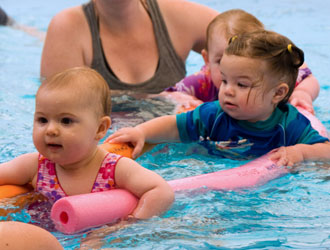 Babies taking swimming lessons at Shapland Swim Schools