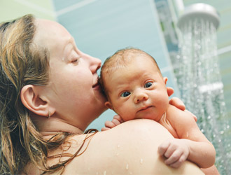 Mother and baby in shower